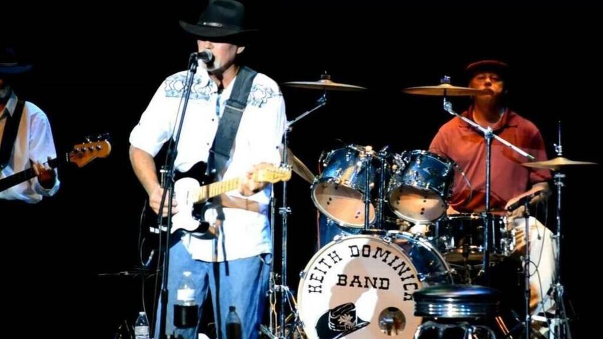 The Keith Dominick Band performs at the Newberry Opera House in August 2016.