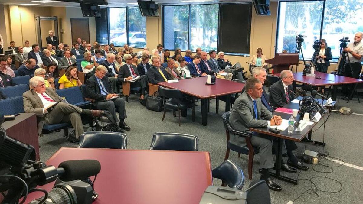 Top SCE&G officials, CFO Jimmy Addison, Generation and Transmission President Stephen Byrne and CEO Kevin Marsh, testify last week before the Public Service Commission.