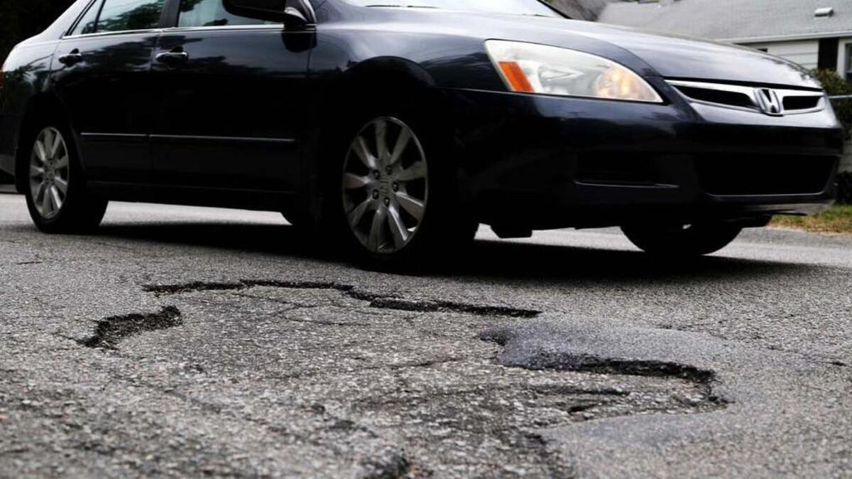 Vehicles have to maneuver around potholes and rough roads throughout South Carolina.
