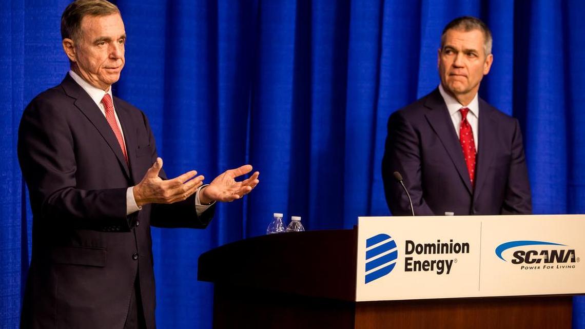 Dominion Energy CEO Thomas Farrell II and SCANA CEO Jimmy Addison announce the companies’ proposed merger.