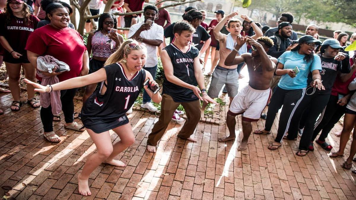 USC students celebrate the progress of the women’s basketball team this spring. How much is black student enrollment increasing?