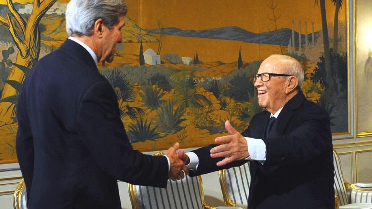 Tunisia’s President Beji Caid Essebsi, right, greets US Secretary of State John Kerry upon his arrival last month at the presidential palace near Tunis.