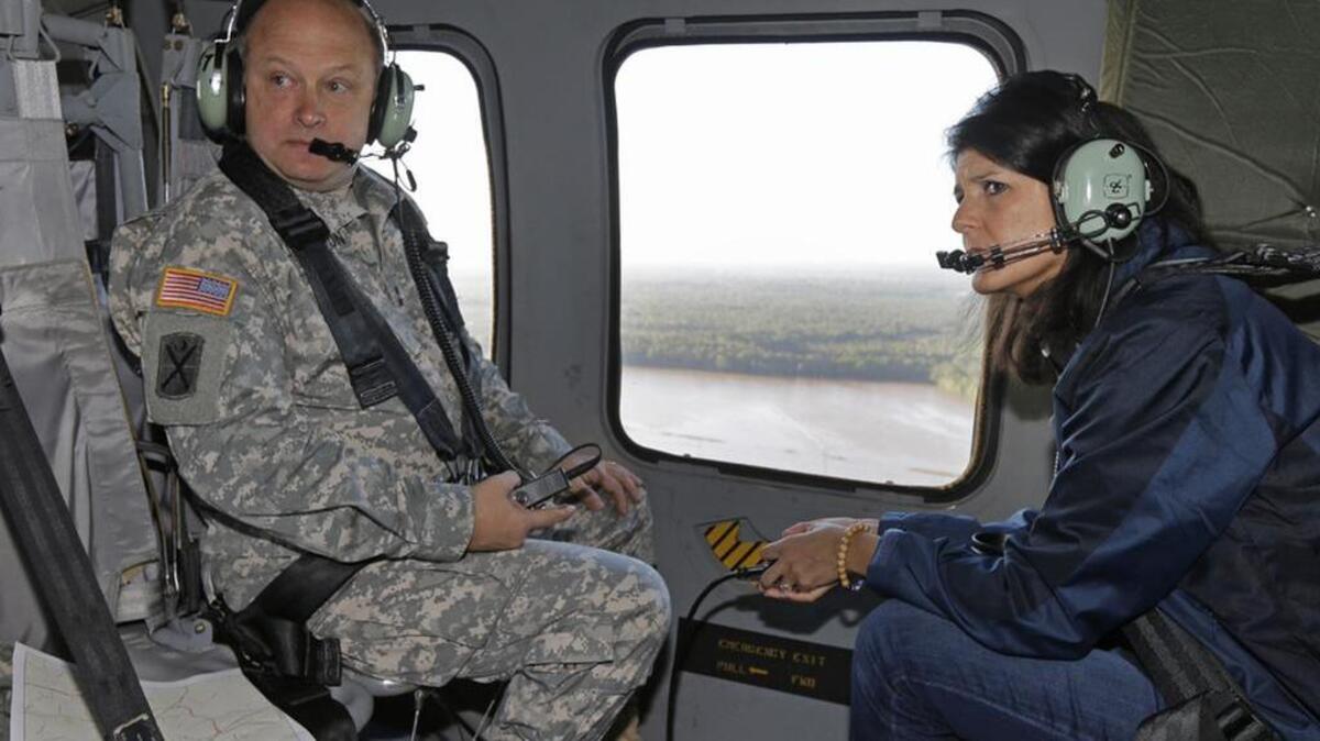 
SC Gov Nikki Haley surveys flood damage.
