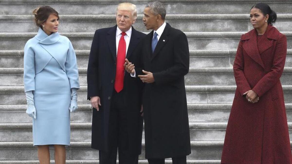 President Donald Trump and former president Barack Obama stand on the steps of the Capitol with first lady Melania Trump and Michelle Obama following the presidential inauguration.