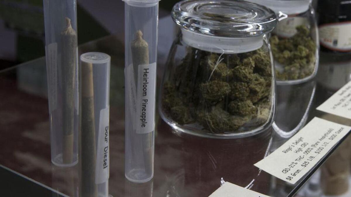 Marijuana products, including pre-rolled cigarettes and buds are displayed at the medical marijuana dispensary in California.