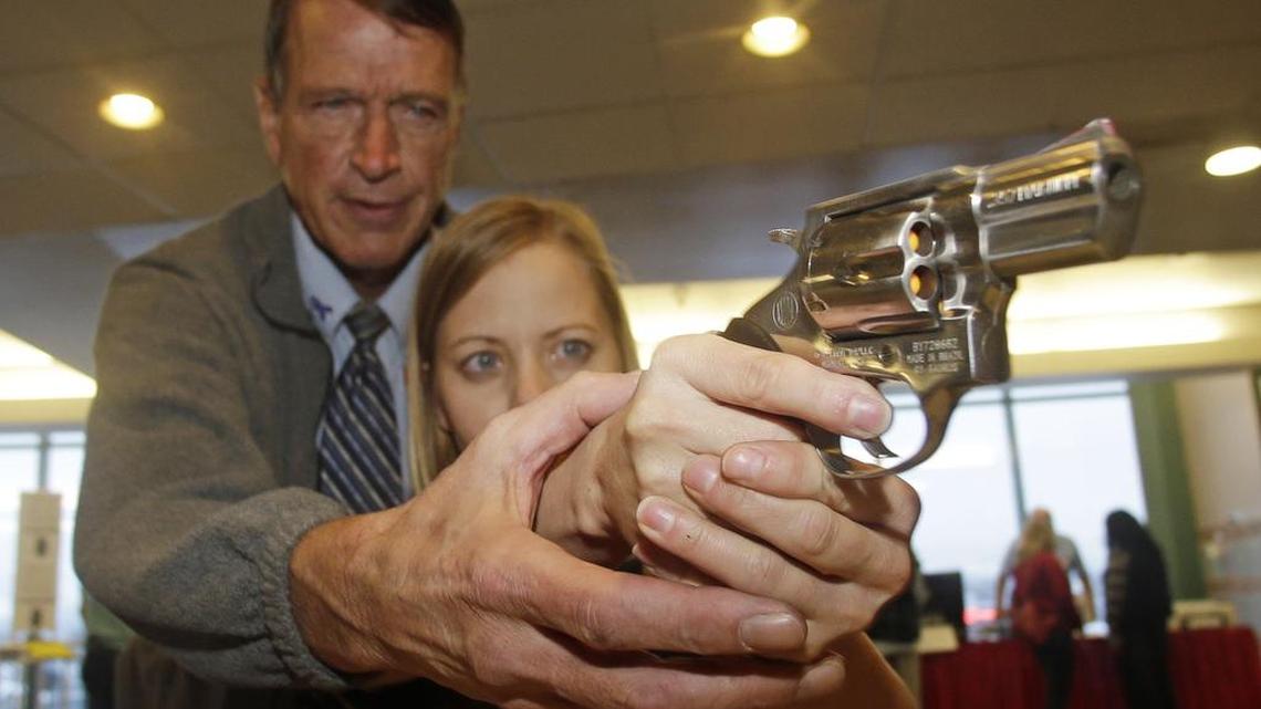 A fourth-grade teacher receives firearms training with a .357 magnum during concealed weapons training.