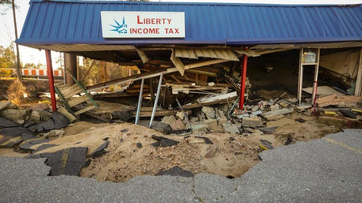 Owen Chastain owns the badly damaged TitleMax building on Devine Street. Chastain has been unable to come to a resolution with the county on what will become of the building. He hopes to tear the building down and sell the property to a developer who will then develop on the land, but he said Richland County has told him that floodplain laws would restrict future development.