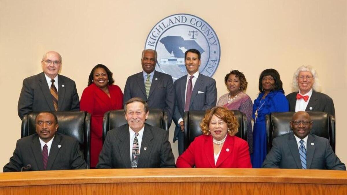 Richland County Council members. Seated: Norman Jackson, Vice Chair Bill Malinowski, Chair Joyce Dickerson, Paul Livingston. Standing: Greg Pearce, Dalhi Myers, Calvin “Chip” Jackson, Seth Rose, Yvonne McBride, Gwendolyn Kennedy, Jim Manning.