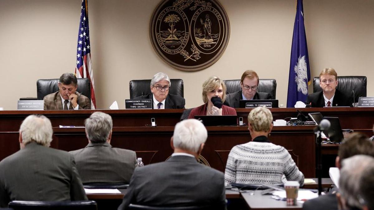 Ken Browne and Carlette Walker testify before the S.C. Public Service Commission on Nov. 20 during hearings into the failed effort by SCE&G, a SCANA subsidiary, to build two nuclear reactors in Fairfield County.