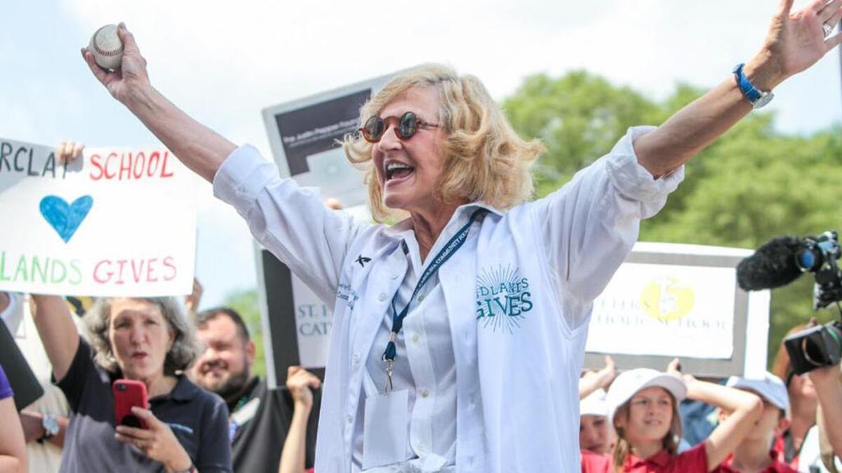 Ridgeway Mayor Charlene Herring celebrates her performance in a pitching contest to raise money for a charity of her choosing during the annual Midlands Gives kickoff in May. More than 300 not-for-profits raised money during the event.
