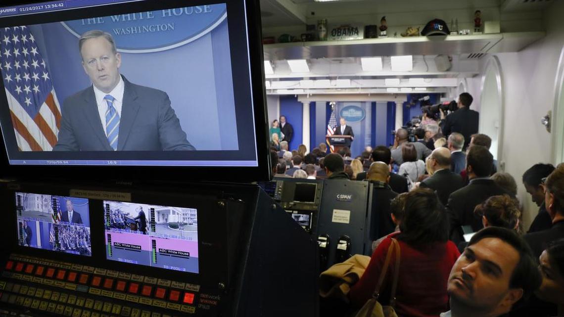 White House Press secretary Sean Spicer is seen on television broadcast monitors as he speaks to the media during the daily briefing on Tuesday.