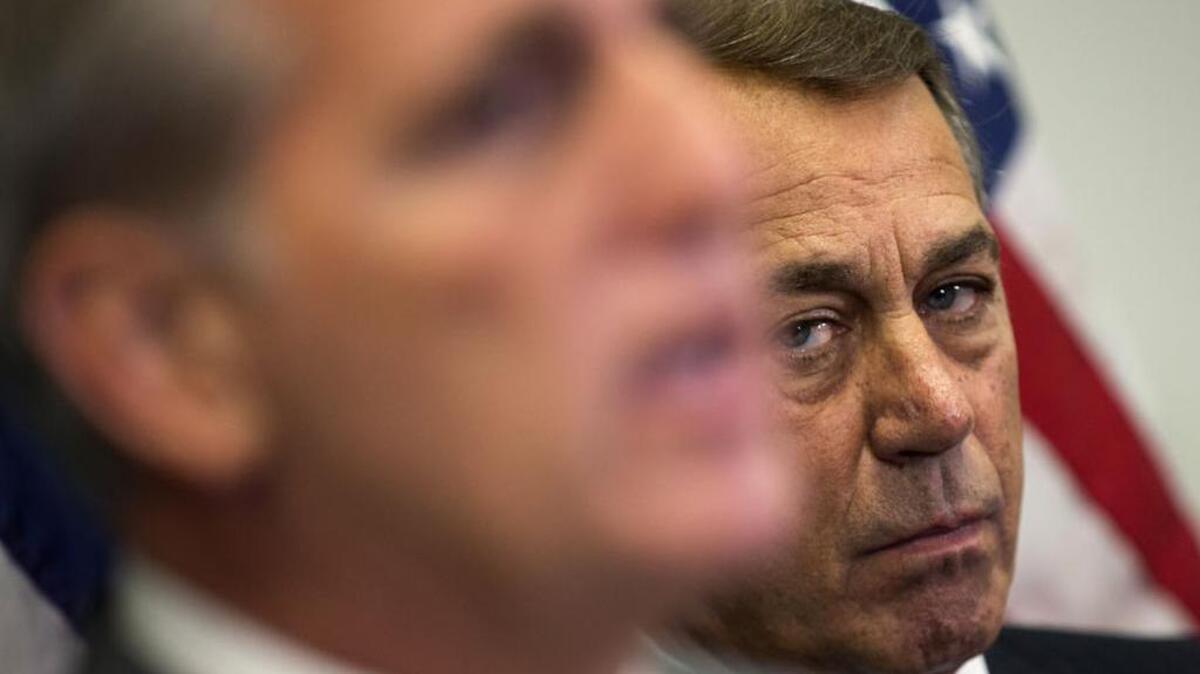 
Outgoing House Speaker John Boehner of Ohio listens as House Majority Leader Kevin McCarthy speaks on Wednesday, a day before he dropped out of the race to succeed Boehner.
