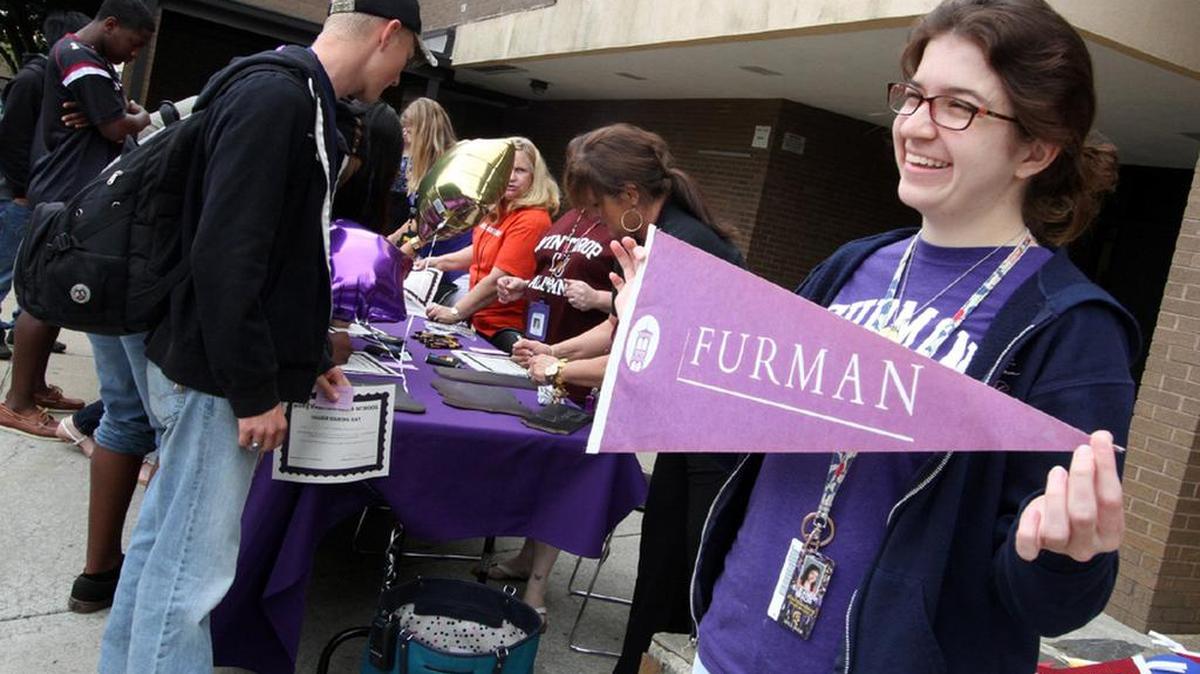 Eleanor Mixon celebrates her choice at college signing day last year at Rock Hill’s Northwestern High School. Do students in poor schools get the same encouragement and preparation help as those at wealthier schools?