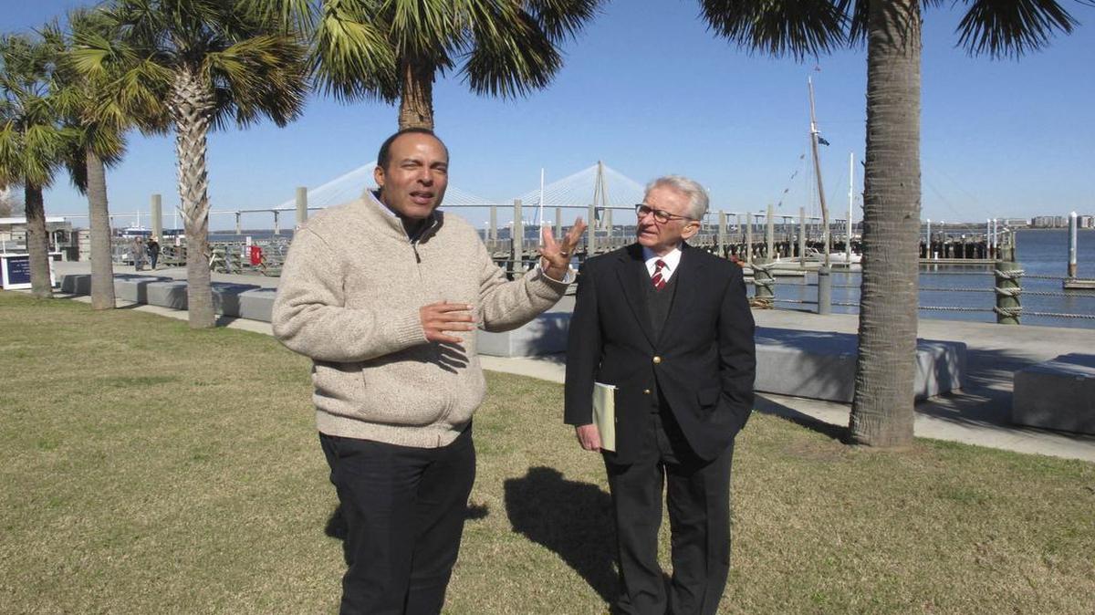 International African American Museum President Michael Moore, left, and former Charleston Mayor Joe Riley discuss plans to build the museum on this site where nearly half of all U.S. slaves first stepped foot on American soil.