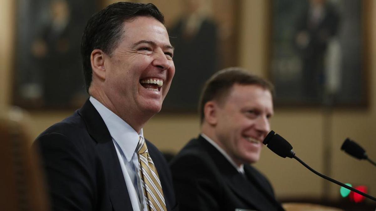 FBI Director James Comey, left, joined by National Security Agency Director Michael Rogers, testifies before the House Intelligence Committee hearing Monday on allegations of Russian interference in the 2016 U.S. presidential election.