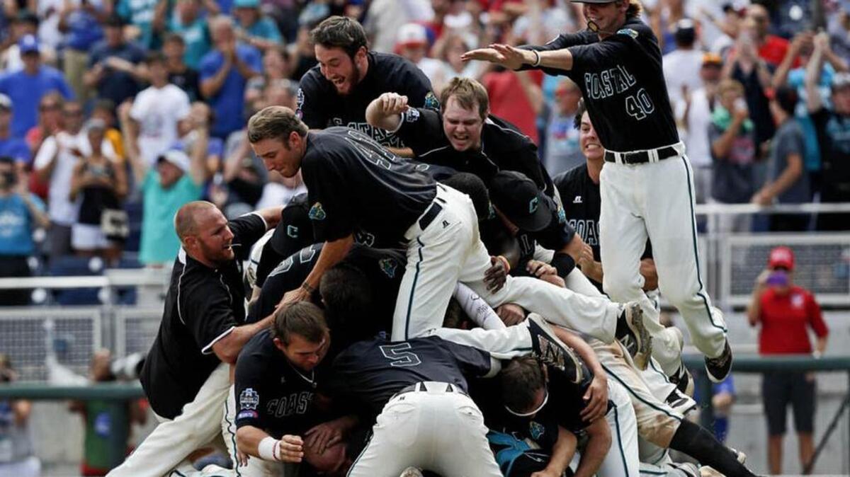 Coastal Carolina Chanticleers celebrate after winning the College Baseball World Series against the Arizona Wildcats.
