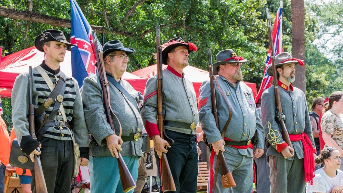 Members of the Sons of Confederate Veterans stand at attention during a ceremony marking the one-year anniversary of the removal of the Confederate flag from the State House grounds. By birth, Confederate sons are now a small minority in South Carolina.