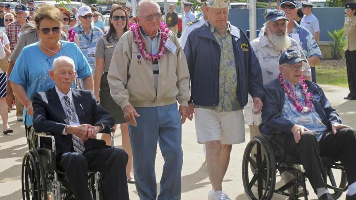 USS Arizona survivors from left, John Anderson, Don Stratton, Louis Conter and Lauren Bruner attend the final official gathering of the USS Arizona Reunion Association, in 2014.