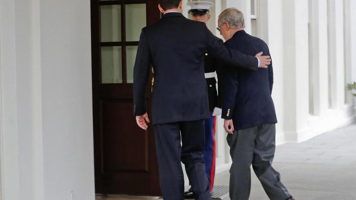House Speaker Paul Ryan and Senate Majority Leader Mitch McConnell walk back into the West Wing of the White House in February after speaking to reporters.