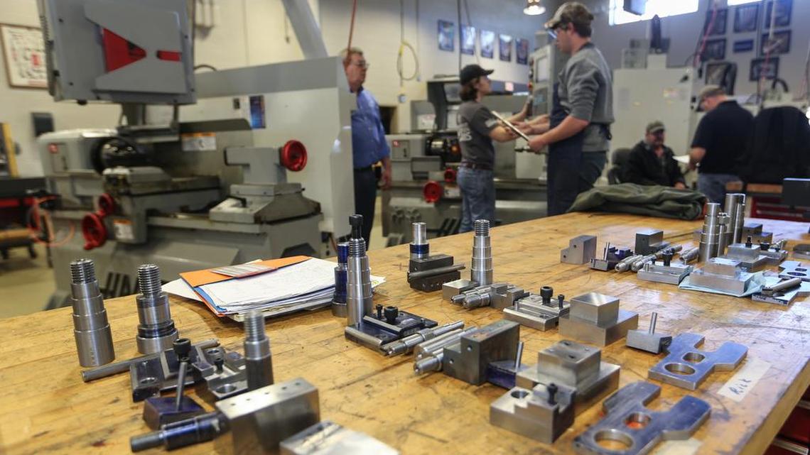 Students work in the machine tool lab at Midlands Technical College to learn skills that SC manufacturers need. Helping more students attend technical college is the goal of promise programs.