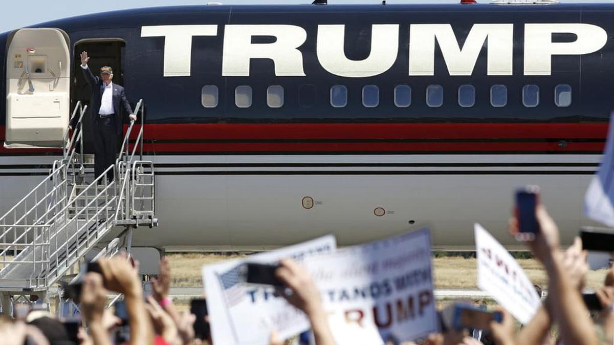 Republican presidential candidate Donald Trump disembarks from his plane for a campaign rally last week in Redding, Calif.