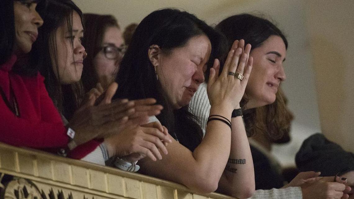 Supporters listen to Democratic presidential candidate Hillary Clinton’s concession Wednesday.