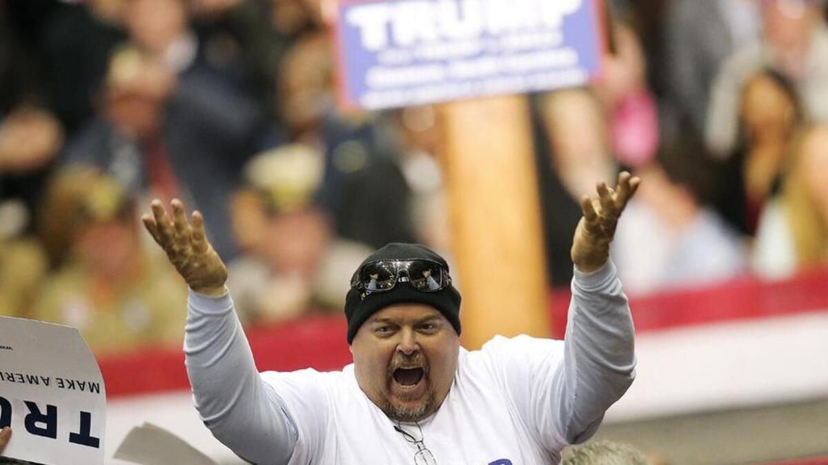 A man cheers before a rally for Republican presidential candidate Donald Trump at Clemson University Wednesday.