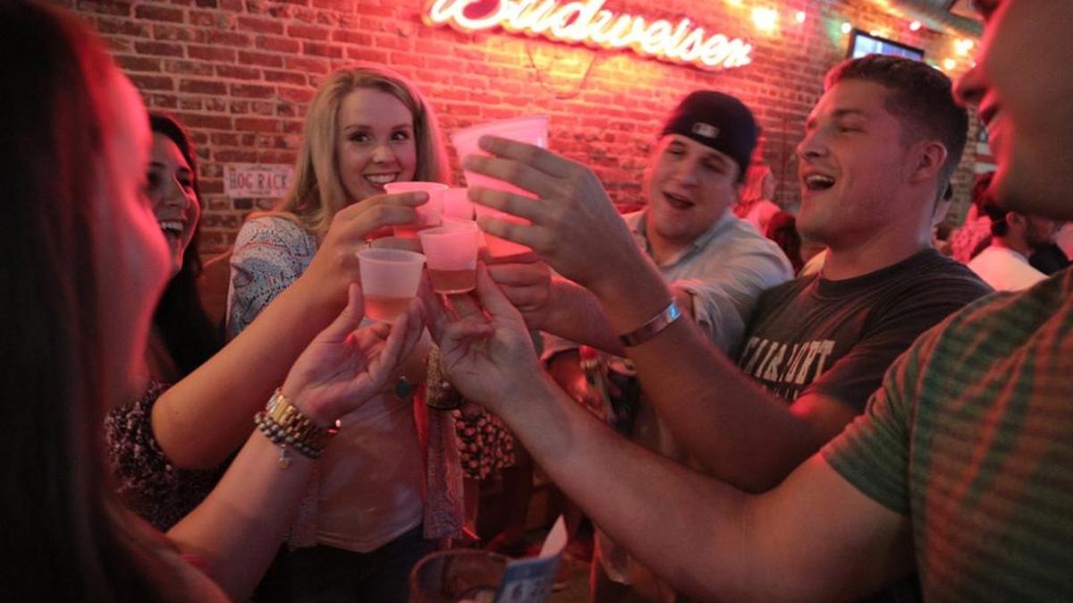 College students enjoy a night in Five Points.