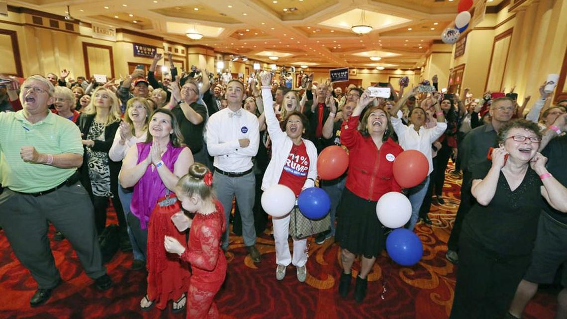 People celebrate at an election night watch party hosted by the Nevada GOP as Republican presidential candidate Donald Trump wins the presidency.