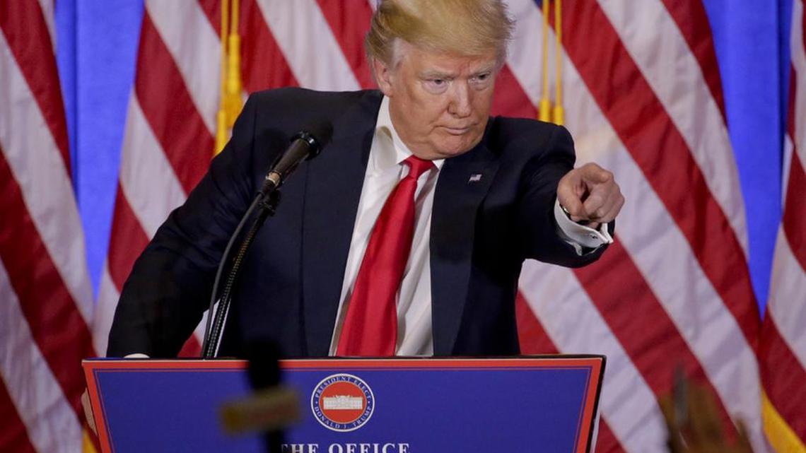 President-elect Donald Trump takes questions during his news conference on Wednesday.