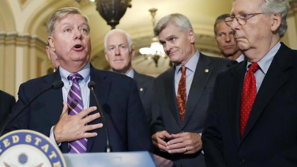 US Sen Lindsey Graham speaks to the media on Tuesday, accompanied by Senate Majority Whip Sen. John Cornyn, Sen. Bill Cassidy, Sen. John Thune and Senate Majority Leader Mitch McConnell.