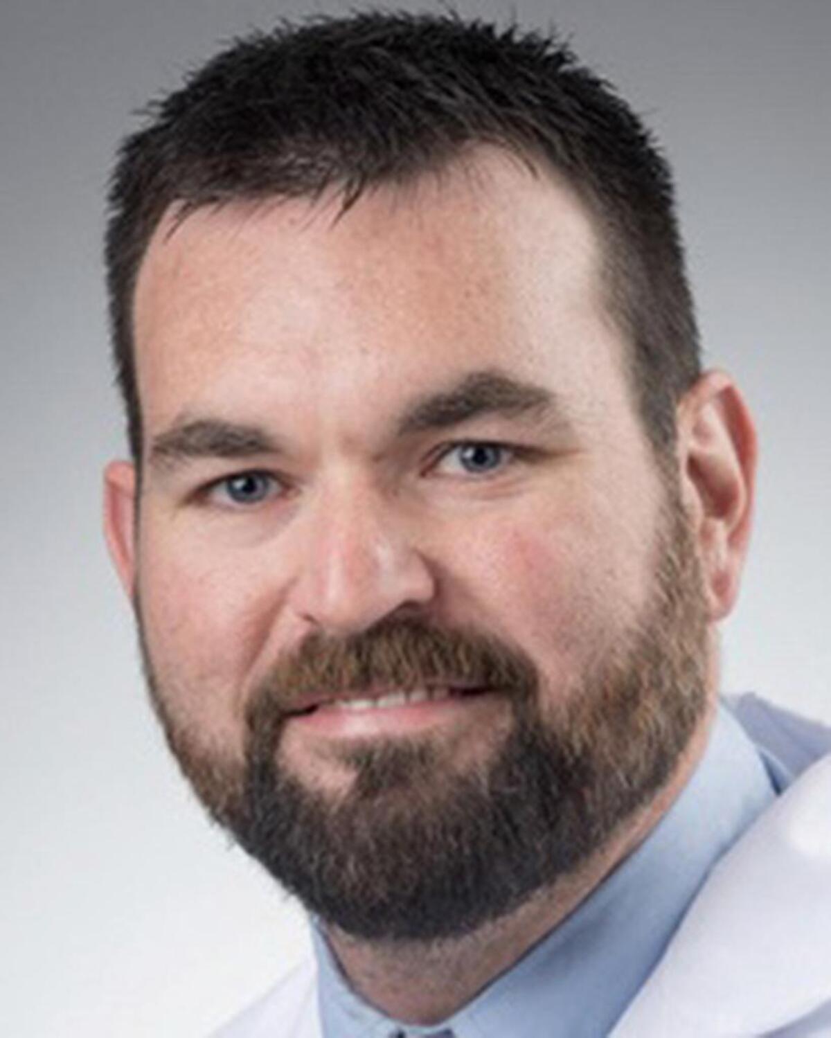 Dr Zach Kiker