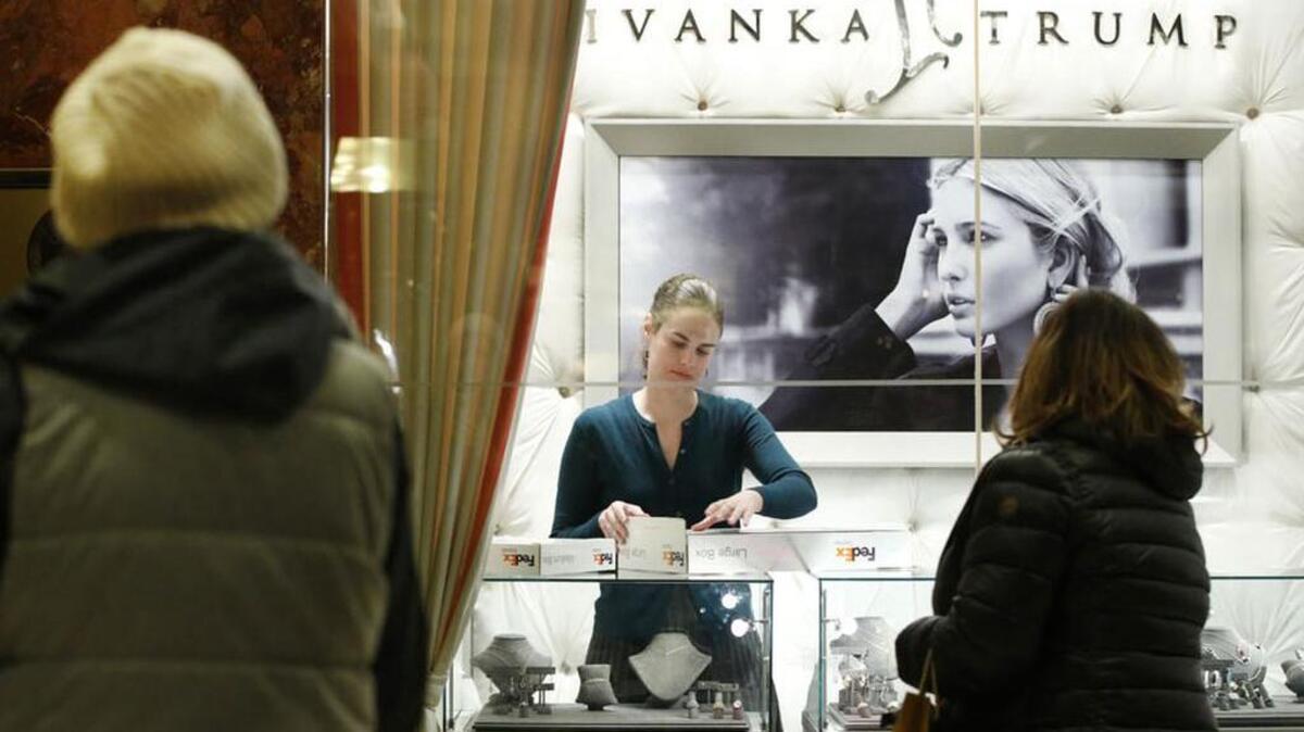 A employee packs boxes for shipping inside a store selling Ivanka Trump's jewelry in the lobby of Trump Tower.