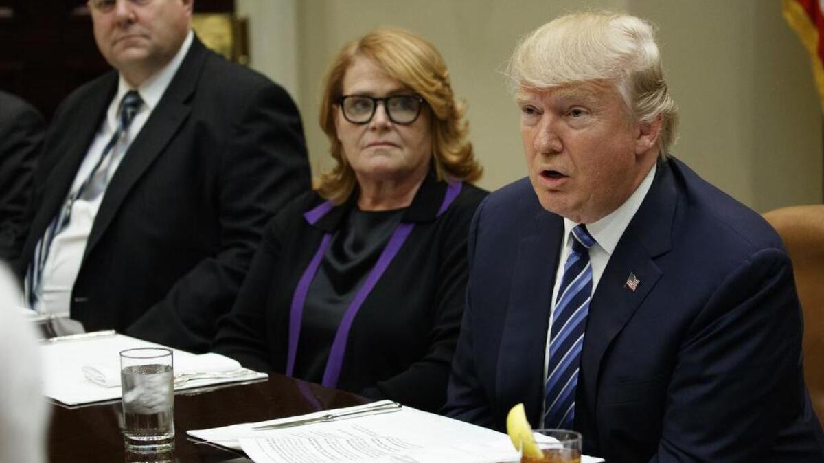 Sen. Heidi Heitkamp, D-N.D., listens as President Donald Trump speaks during a meeting with Senators in February on his Supreme Court Justice nominee Neil Gorsuch.