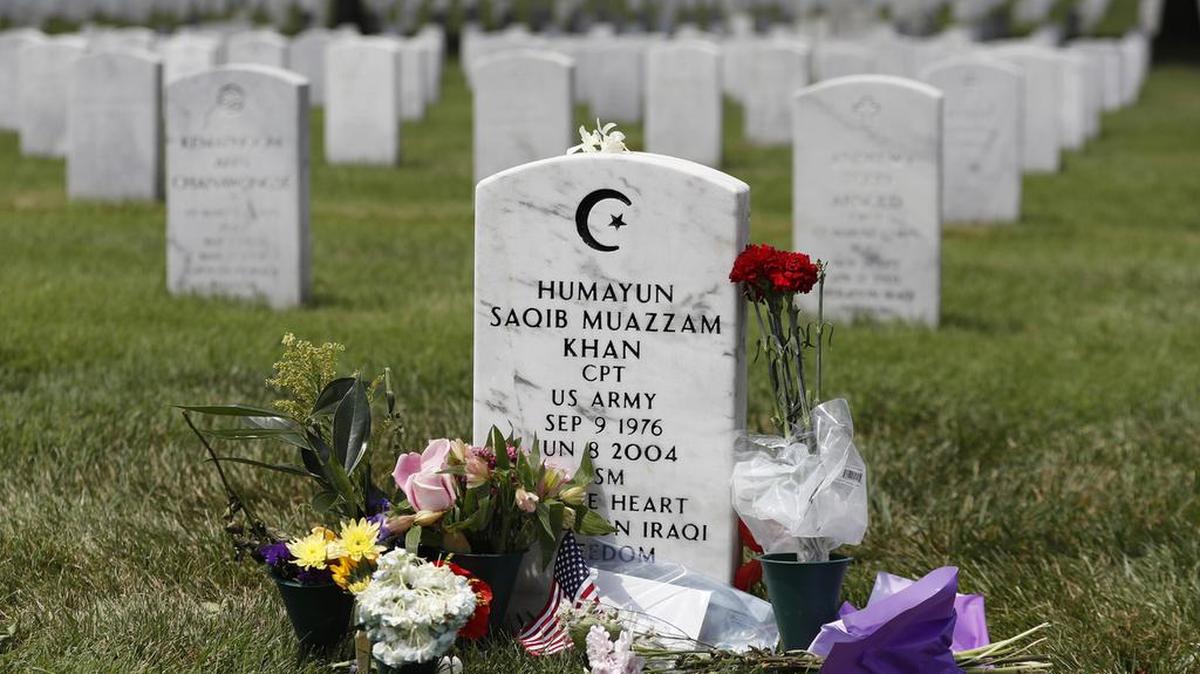 The tombstone of US Army Capt Humayun S. M. Khan is seen in Section 60 at Arlington National Cemetery in Arlington, Va. Republicans are joining the rising chorus of criticism of Donald Trump for his disparagement of the bereaved parents of the Muslim soldier who was awarded a Bronze Star after he was killed in 2004 in Iraq.