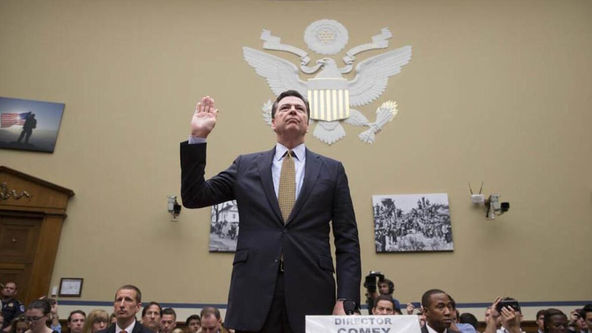 FBI Director James Comey is sworn in to testify before the House House Oversight and Government Reform Committee hearing on his agency’s recommendation to not prosecute Democratic presidential candidate Hillary Clinton over her private email setup.