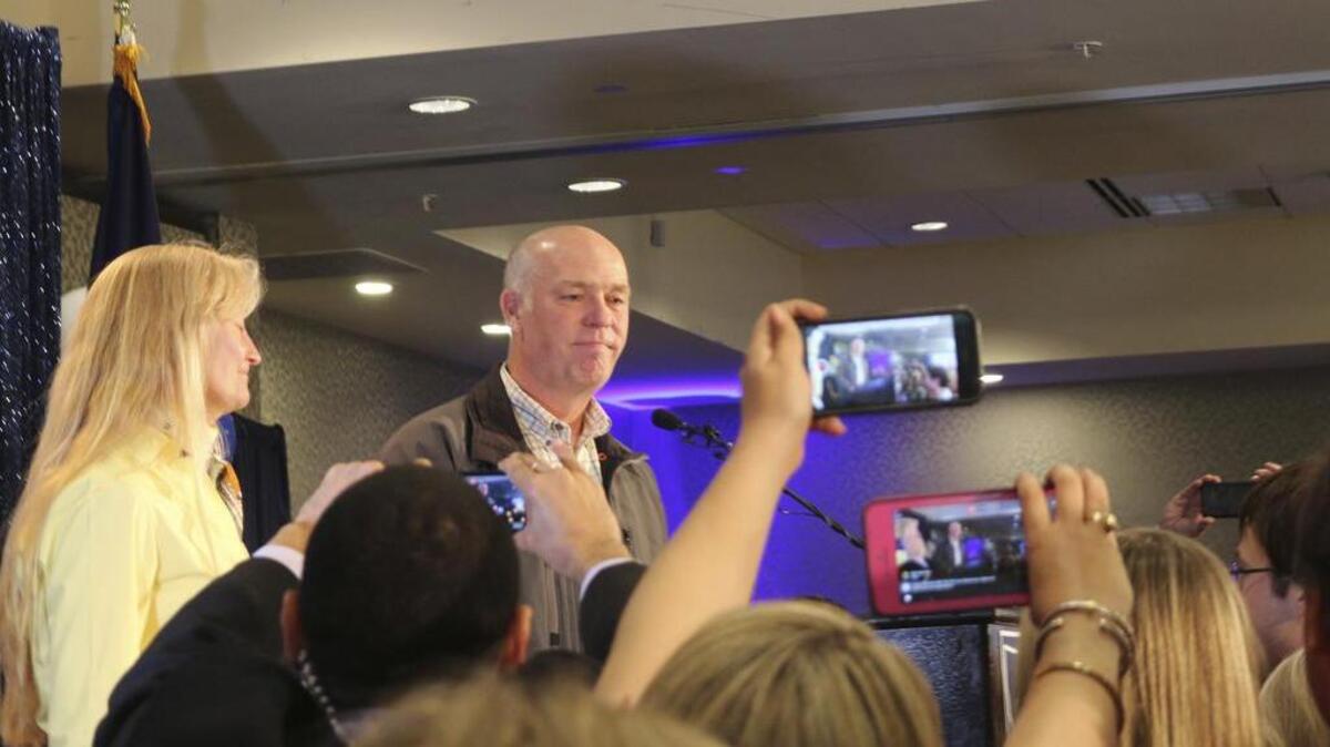Republican Greg Gianforte greets supporters Thursday after winning Montana’s sole congressional seat. In his speech, Gianforte apologized for a altercation at his with a reporter the previous day that led to a misdemeanor assault citation.