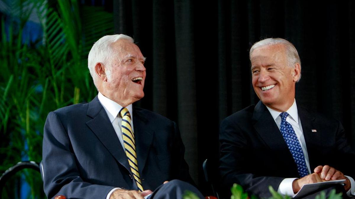 Joe Biden, right, laughs with his friend Fritz Hollings during a 2010 ceremony at USC.