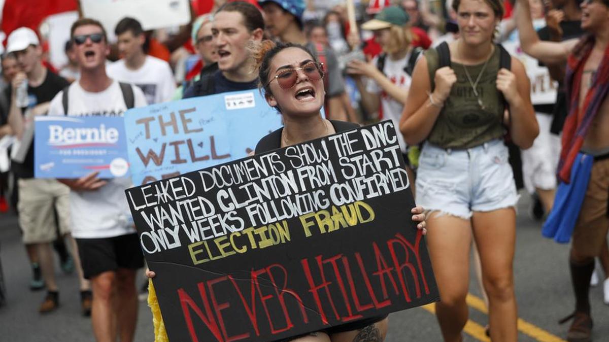 Supporters of Sen. Bernie Sanders protest outside the Democratic National Convention a day after emails presumably stolen from the DNC were posted to the website Wikileaks.