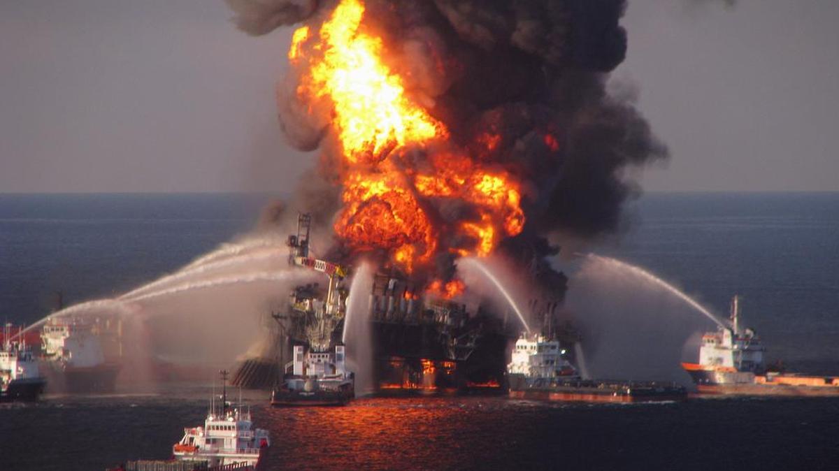 In this2010 file photo provided by the U.S. Coast Guard, fire boat response crews spray water on the burning BP Deepwater Horizon offshore oil rig. Many South Carolinians fear that opening our coast to drilling could subject us to similar dangers.