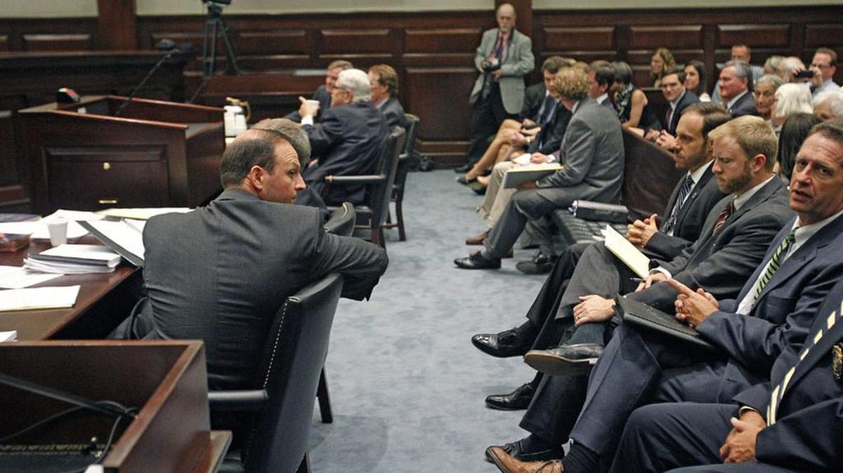 SC Attorney General Alan Wilson chats with his his legal team in 2014 as they wait for the the Supreme Court justices to arrive to hear oral arguments in the appeal of a lower court order that said he could not continue a criminal investigation into then-House Speaker Bobby Harrell.
