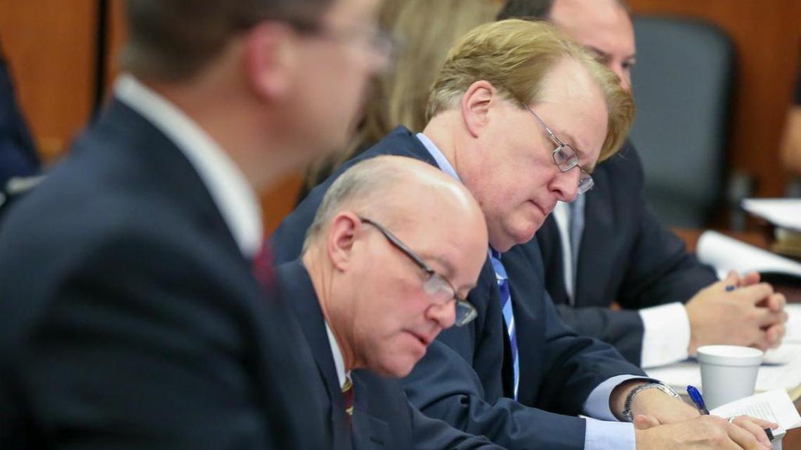 Rick Quinn and his attorneys, Johnny Gasser and Matthew Richardson, listen and make notes as Solicitor David Pascoe, foreground, makes a presentation at the former House member’s guilty plea on Wednesday. One slide Mr. Pascoe showed suggested that Mr. Quinn tried to take credit for the ideas in a column I wrote.