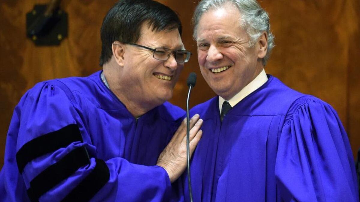 SC Lt Gov Henry McMaster shares a laugh with House Speaker Jay Lucas during a joint session of the Legislature.