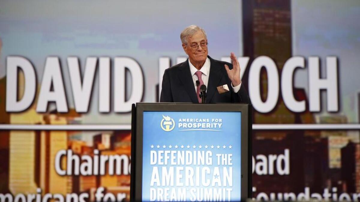 Chairman of the board of Americans for Prosperity David Koch speaks at a 2015 summit.