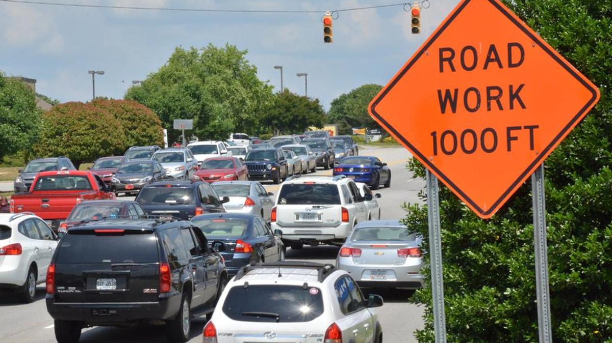 Traffic creeps along Harbison Boulevard.