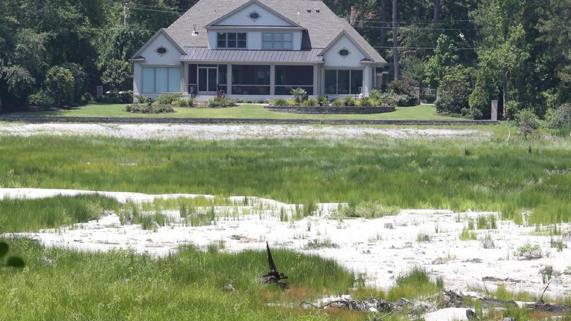 What was once Rockford Lake, formed by damming Gills Creek at Overcreek Road, is now a meandering creek winding its way through a dry lakebed. The dam over Upper Rockford Lake was destroyed during the October 2015 floods.