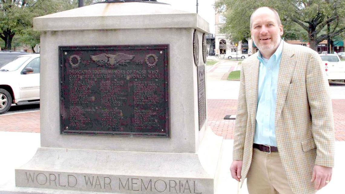 
Greenwood Mayor Welborn Adams stands beside the Greenwood County memorial that honors its citizens who died in recent wars. The mayor’s push to replace old plaques that split soldiers killed in World War I and II into “white” and “colored” was rejected by the SC Legislature.
