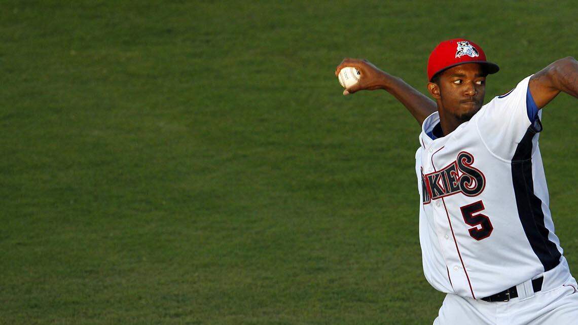 C.J. Edwards delivers a pitch for the Tennessee Smokies at Smokies Stadium, August 14, 2014.