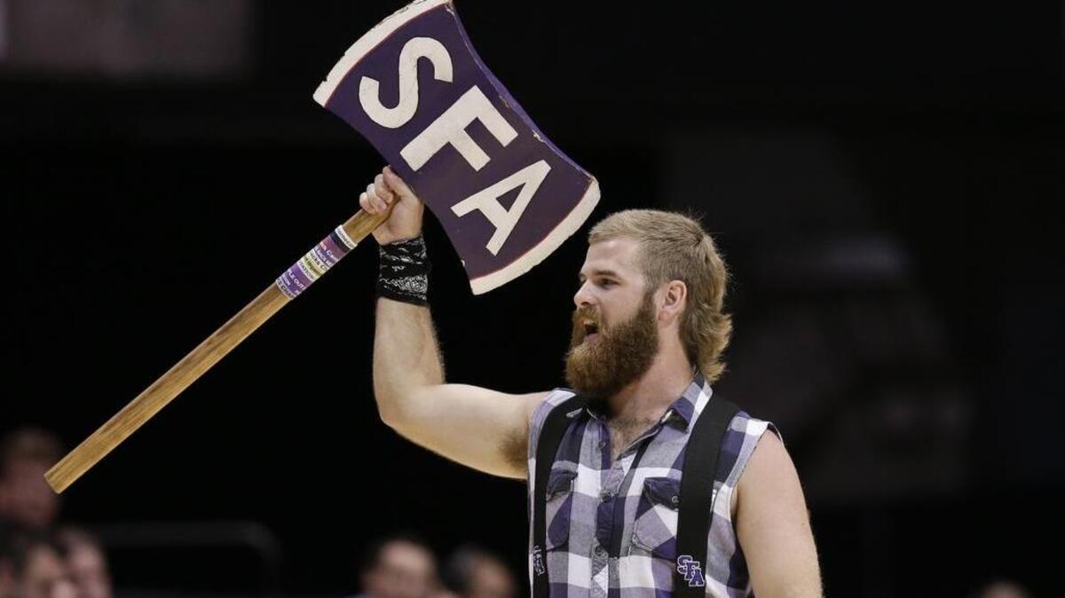 FILE - In this March 23, 2014, file photo, the Stephen F. Austin lumberjack mascot is shown during a college basketball game against UCLA, in San Diego.
