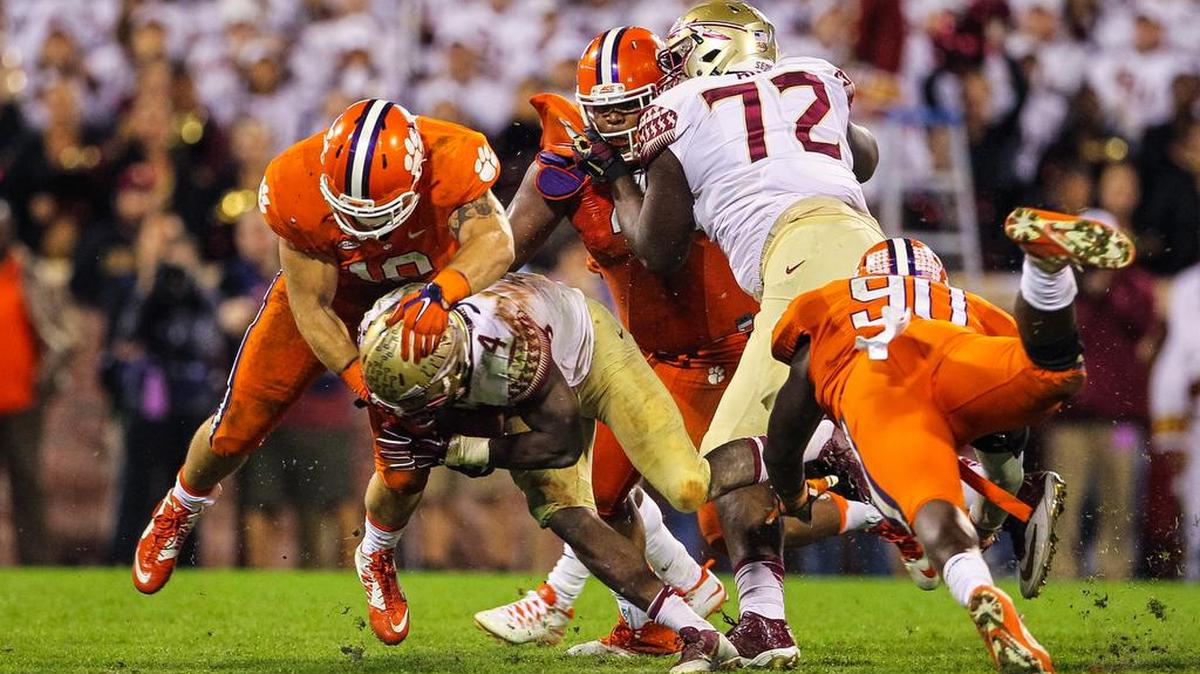 Clemson linebacker Ben Boulware (10) stops Florida State running back Dalvin Cook (4) on a critical fourth down late in Clemson’s 23-13 win.